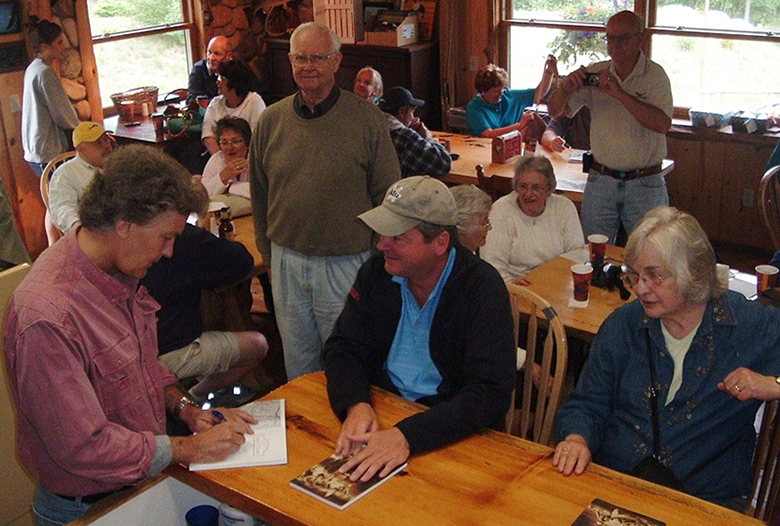 Jon signing books